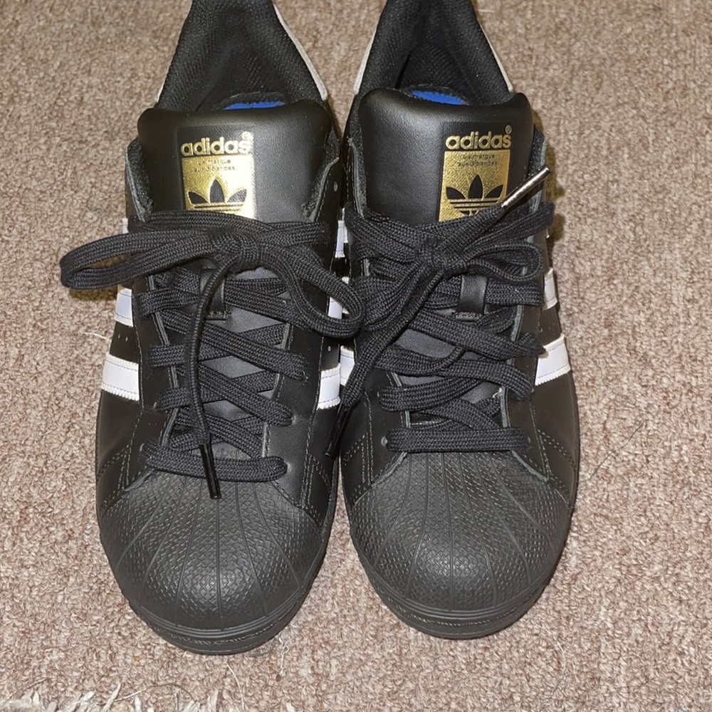 Gently used shell toe adidas